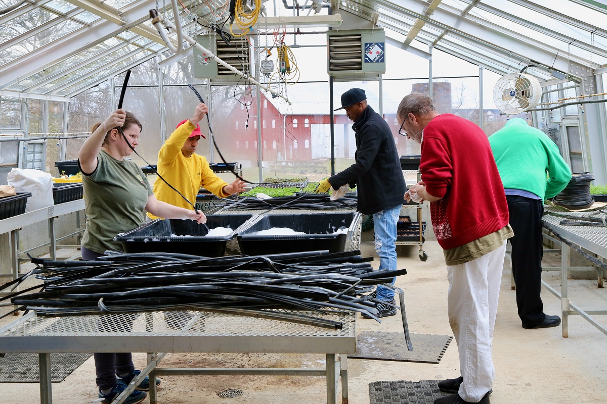 Prepping drip tape for weaving them into bags